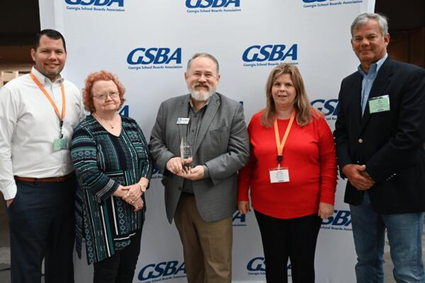 BCSS BOE Members Jordan Raper, Lynn Stevens, Beverly Kelly and Bill Ritter with Superintendent Dr. Chris McMichael at the Georgia School Boards Association Annual Conference.