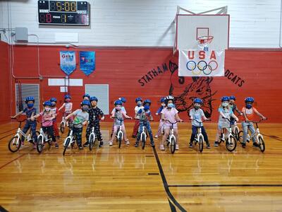 Students ready to ride with their new helmets