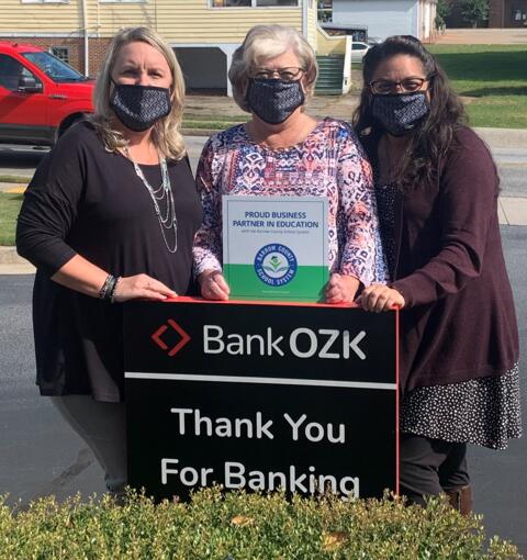 Bank OZK staff with PIE sign