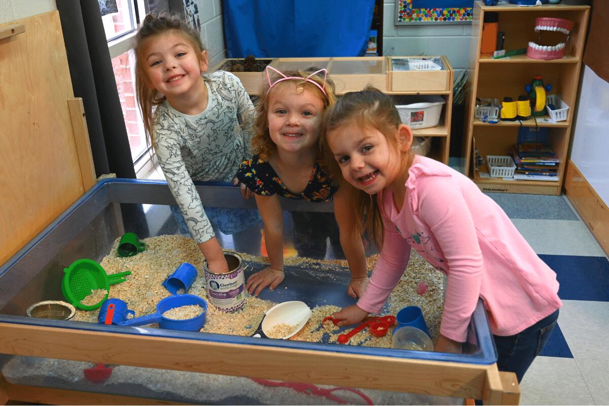 Pre-K students at table