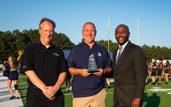 (L-R): Jon Nelson, GPB Sports; Ralph Neeley, Apalachee High School assistant principal and athletic director; and Tino Johnson, Jackson EMC business development manager
