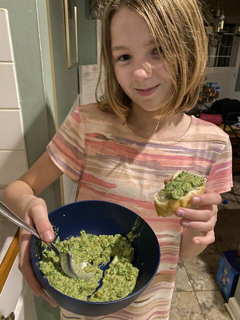 Maisy making kale pesto!