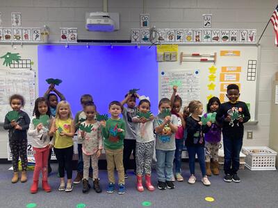 Students show christmas craft they made